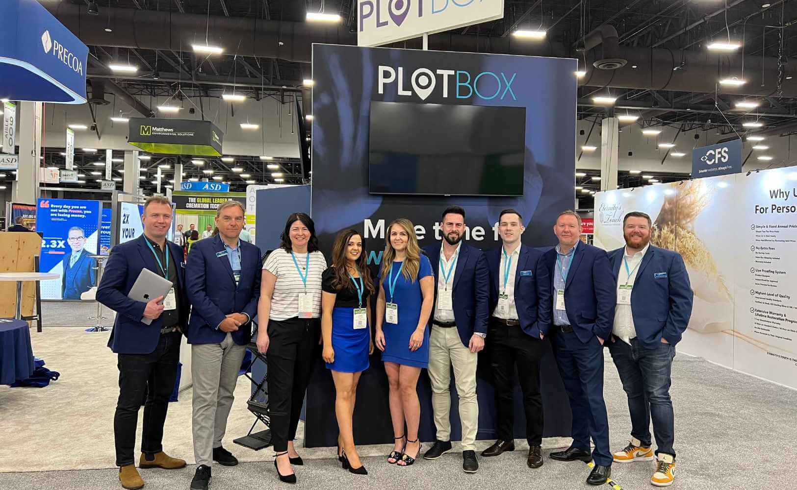 PlotBox staff at a conference PlotBox staff at a conference